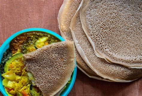 Flat Lay View of Injera with Lentils and Vegetables, Injera is a Sour ...