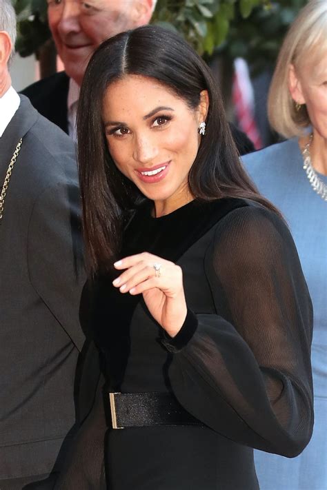 Meghan Markles Black Dress For Her First Solo Appearance Will Give You Princess Diana Vibes