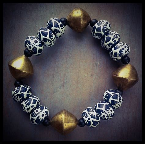 African Krobo beads from Ghana and baoulè bronze from Ivory Coast by