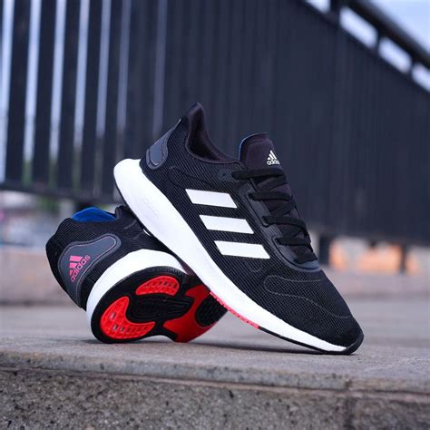 Jual SEPATU PRIA OLAHRAGA ADIDAS GALAXAR BOUNCE BLACK WHITE SOLE ORANGE