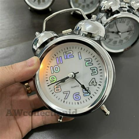 Jual Jam Weker Alarm Kring Silver Dengan Motif Glow In The Dark