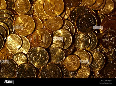 Background of the golden coins of Ukraine Stock Photo - Alamy