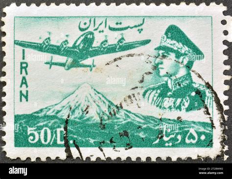 Cancelled Postage Stamp Printed By Iran That Shows Plane Above Mosque