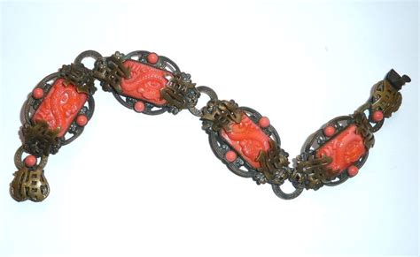 Neiger Oriental Style Bracelet In Coral Coloured Glass Photographed By