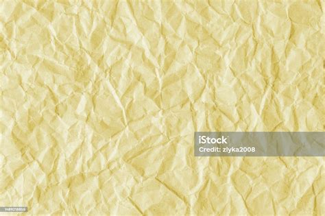 Recycled Crumpled Yellow Paper Texture Background Stock Photo