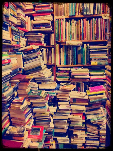 Cozy Reading Nook With A Tower Of Books