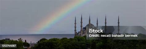 Sultan Ahmed Mosque In Front Of A Cloudy Day Against A Rainbow