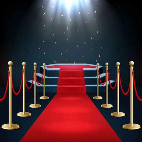 Podium With Red Carpet And Barrier Rope In Glow Of Spotlights In