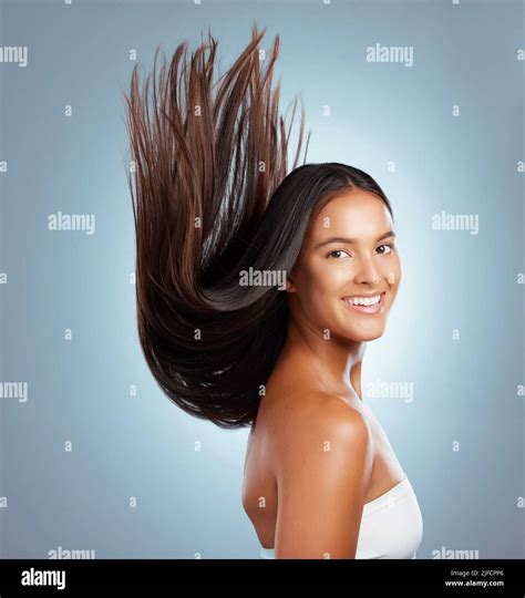 Portrait Of A Hispanic Brunette Woman With Long Lush Beautiful Hair
