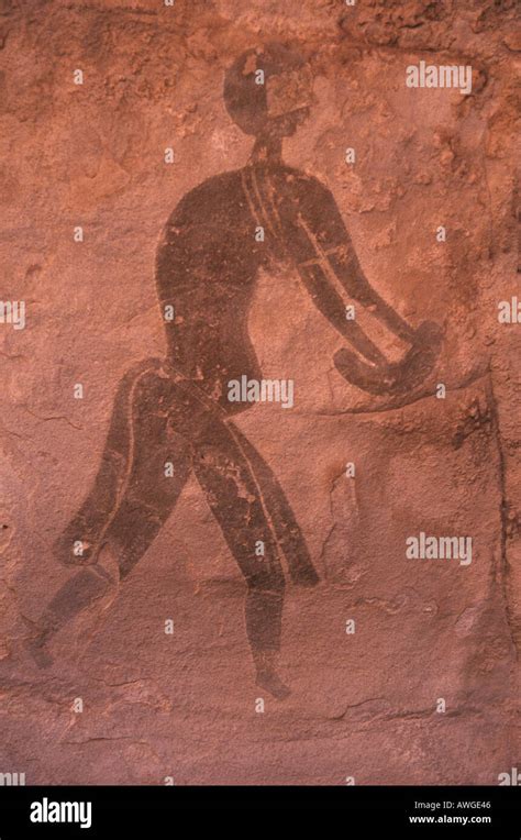 South Algerian Sahara Desert Tassili N Ajjer Site Of Sefar Neolithic Rock Painting Of Figure