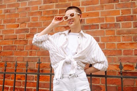 Premium Photo Portrait Of A Young Woman With A Short Haircut Posing