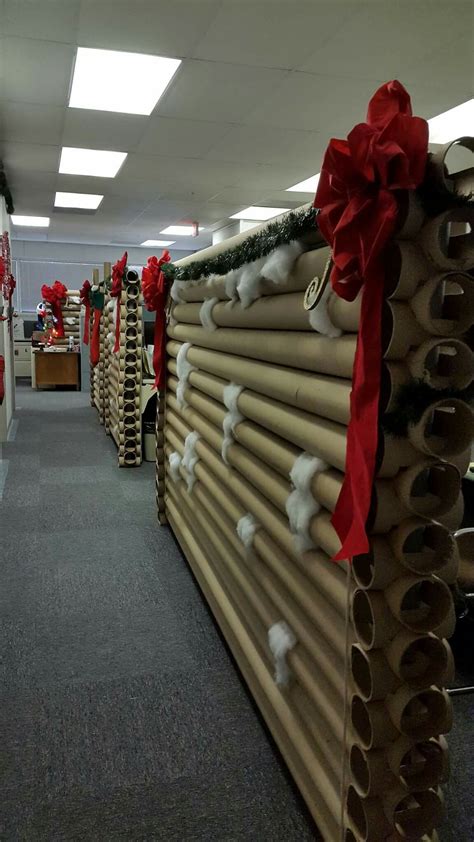 Woman Turns Her Work Cubicle Into A Festive Log Cabin For The Ages