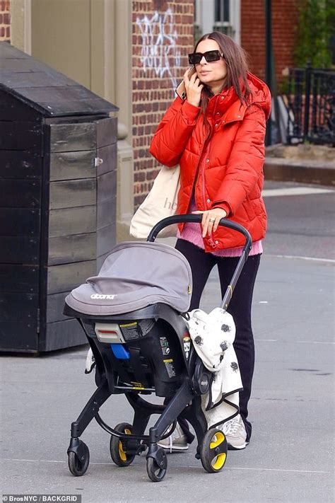 Emily Ratajkowski Bundles Up In A Red Jacket For Lunch In New York With