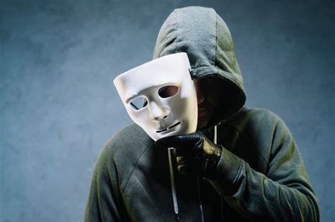 Premium Photo Hacker Holding Mask Mask Medical Identity Hacker