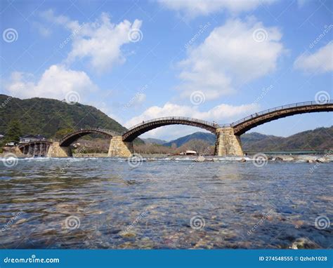 Kintaikyo Bridge In Iwakuni Japan A Wooden Bridge Over The River