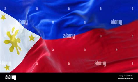 Close Up View Of The Philippines National Flag Waving In The Wind The