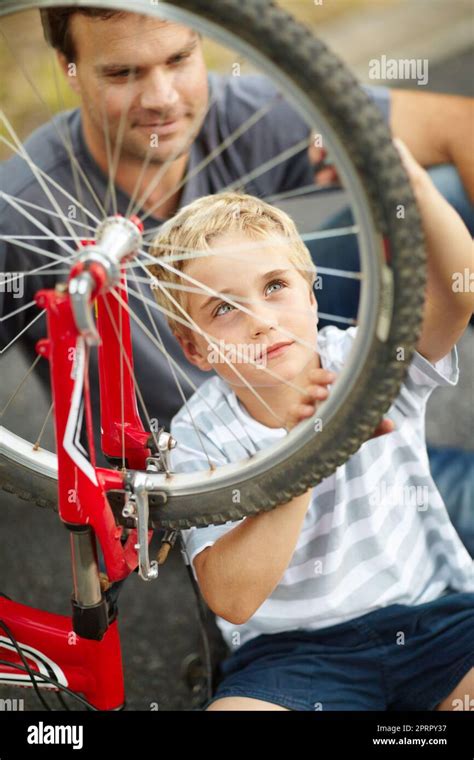 A New Learnt Skill He Wont Forget Young Father Teaching His Son How To