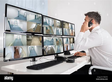 Security System Operator Looking At Cctv Footage Stock Photo Alamy