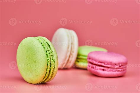 Macaroons on pink background 9755107 Stock Photo at Vecteezy