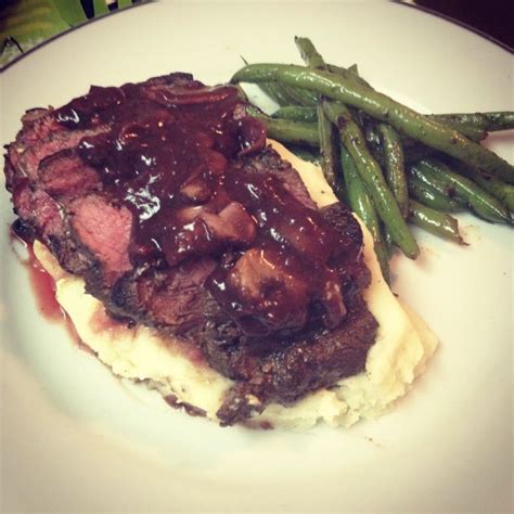 Beef Tenderloin Topped With A Port Wine Mushroom Reduction Garlic Mash Potatoes And Fresh