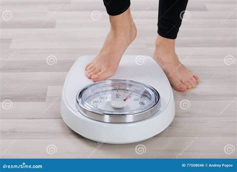 Person Standing On Weighing Scale Stock Photo Image Of Weighing