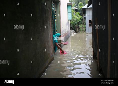 A Woman Is Seen Flooded Area In Munshiganj Near Dhaka Bangladesh On