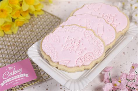 Pretty pink birthday biscuits - Cakey Goodness