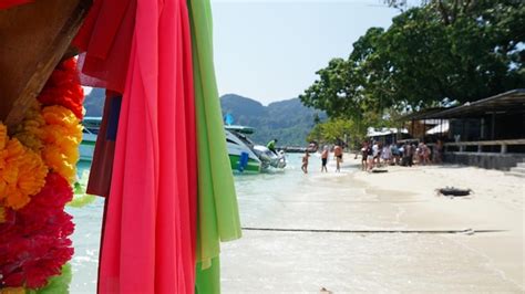 Premium Photo Sea Longtailed Boats Traditional Thai Boats