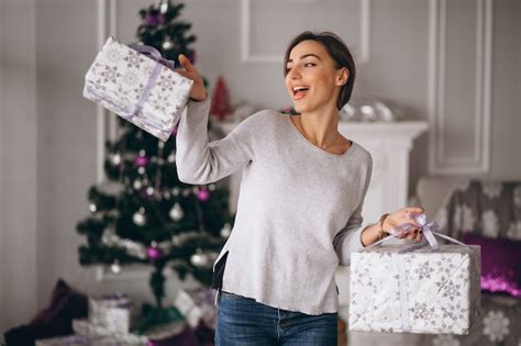 Free Photo Woman With Big Christmas Presents