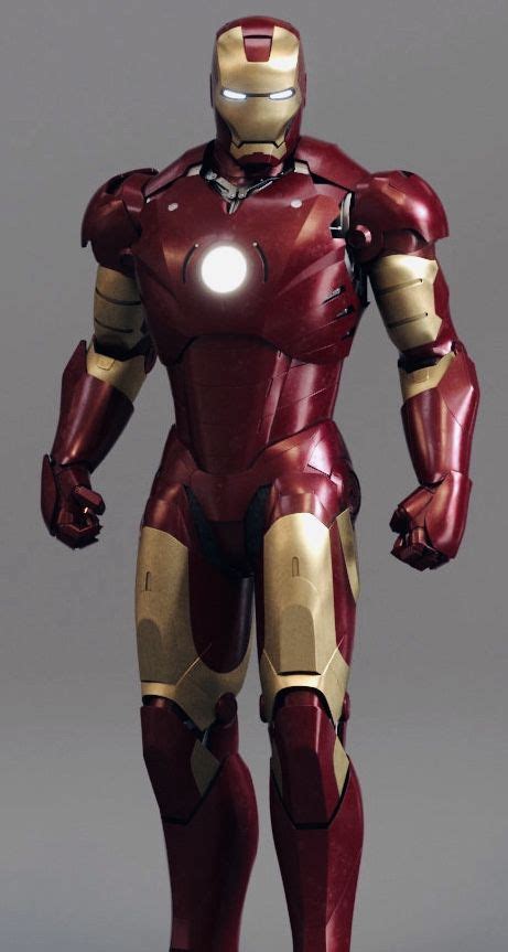 An Iron Man Standing In Front Of A Gray Background