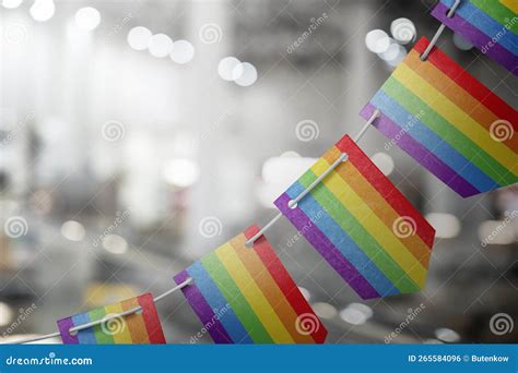 A Garland Of Lgbt National Flags On An Abstract Blurred Background