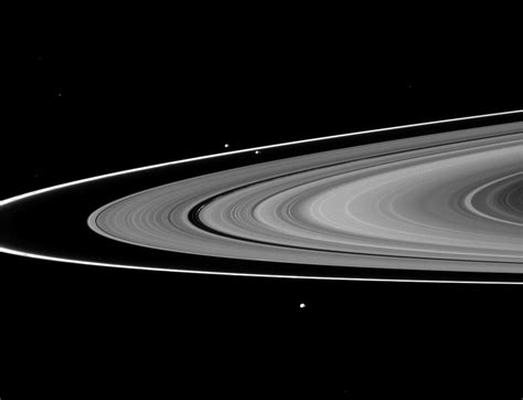 Weirdly Colored Saturn Moons Linked to Ring Features, NASA's Cassini ...