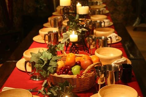 Medieval Dinner With Fruit In Baskets On Tables Medieval Banquet
