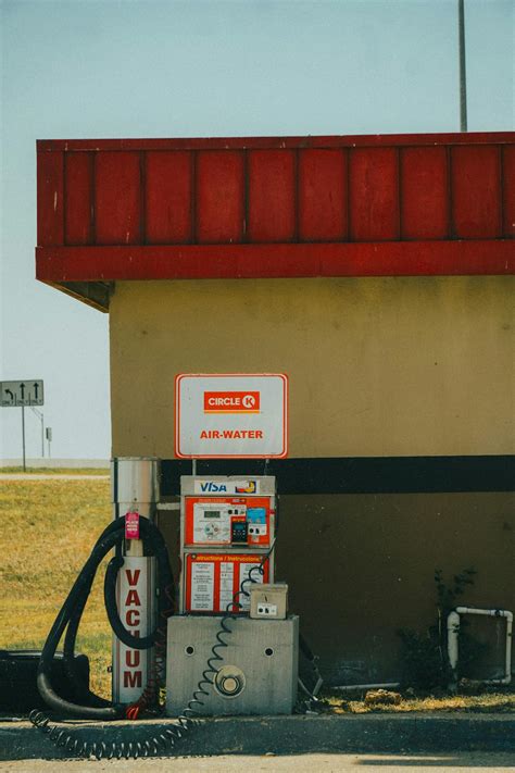 White And Black Gas Pumps · Free Stock Photo