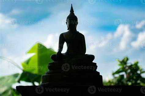 Buddha statue on sunset background,buddha silhouette on blue sunset ...