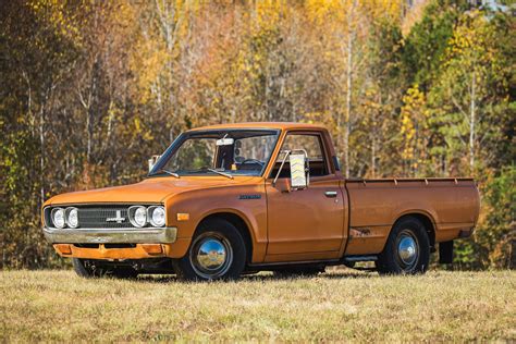 This 1974 Datsun 620 Bulletside Cruises With The Help Of Sniper Efi