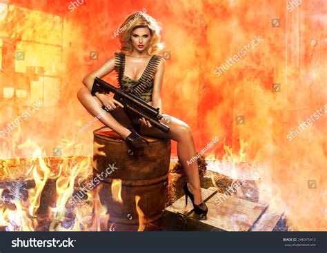 Sexy Blonde Woman Rifle Fire Stock Photo 246975412 Shutterstock