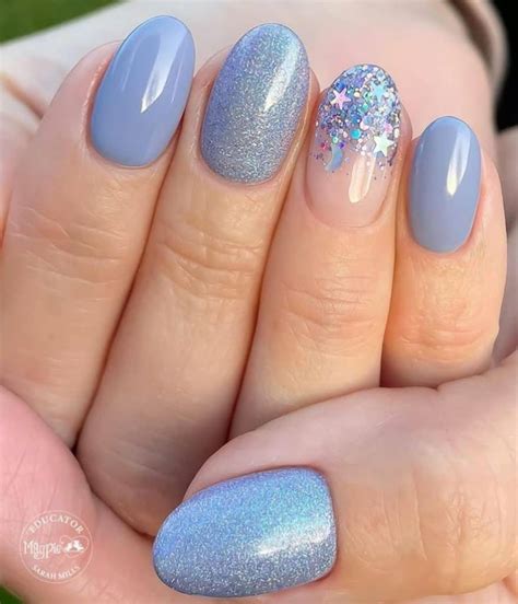 Dazzling Blue Nails With Glitter For Your Next Manicure