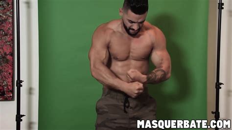 Alluring Gay Stud Shows His Muscles And Strokes His Dick