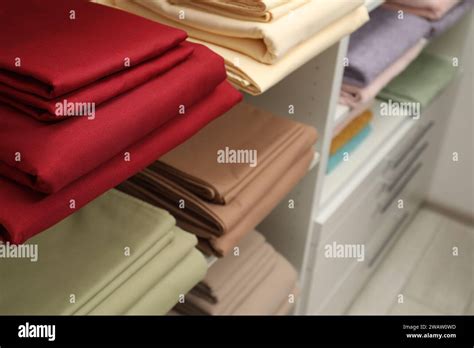 Different Colorful Bed Linens On Display In Shop Closeup Stock Photo