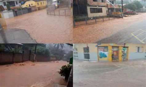 Chuva forte transborda Córrego da Carioca e alaga ruas em Itabirito