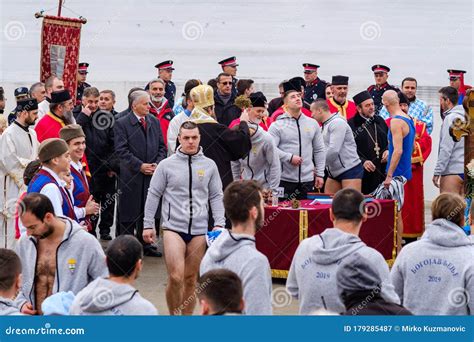 Orthodox Christians Swimming For The Holy Cross In The Icy Cold Water