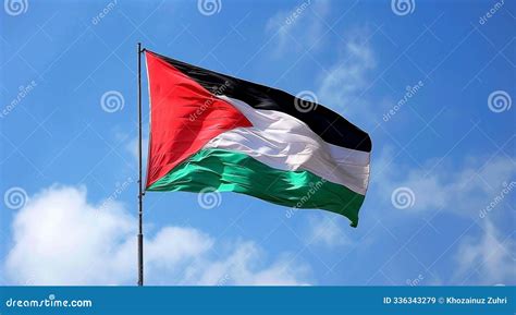 A Palestine Flag Waving Over Jerusalem At Beautiful Cloudy Sky