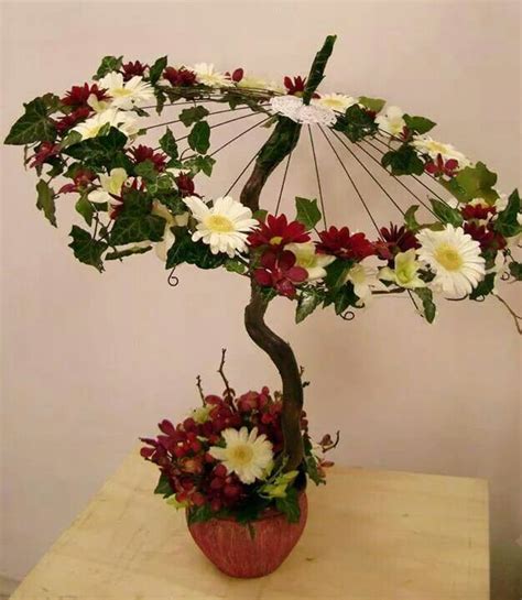 This is different | Floral umbrellas, Flower arrangements, Floral ...