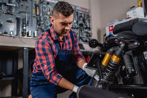 Young Mechanic In Workwear Making Diagnostics Stock Image Image Of