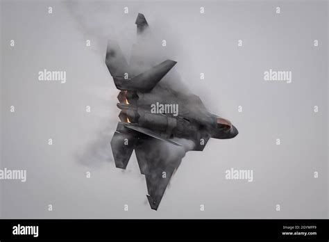 U S Air Force Maj Josh Gunderson F 22 Raptor Demonstration Team Commander And Pilot Performs