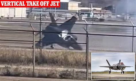 Dramatic moment pilot ejects from $100M F-35B jet before it crashes nose-down onto the tarmac