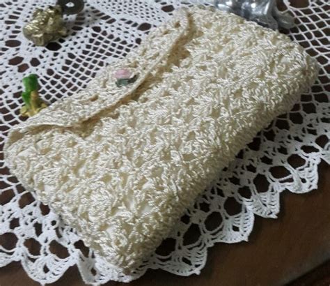 A White Lace Doily On Top Of A Wooden Table