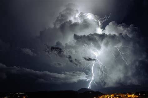 Big Lightning Strikes The Ground At Night Stock Photo Image Of