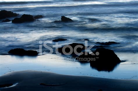 Silhouette of Rock Detail and Beach AT Sunset Stock Photos - FreeImages.com